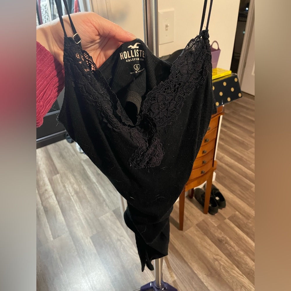 Hollister black bodysuit. Lace trim. Size small.